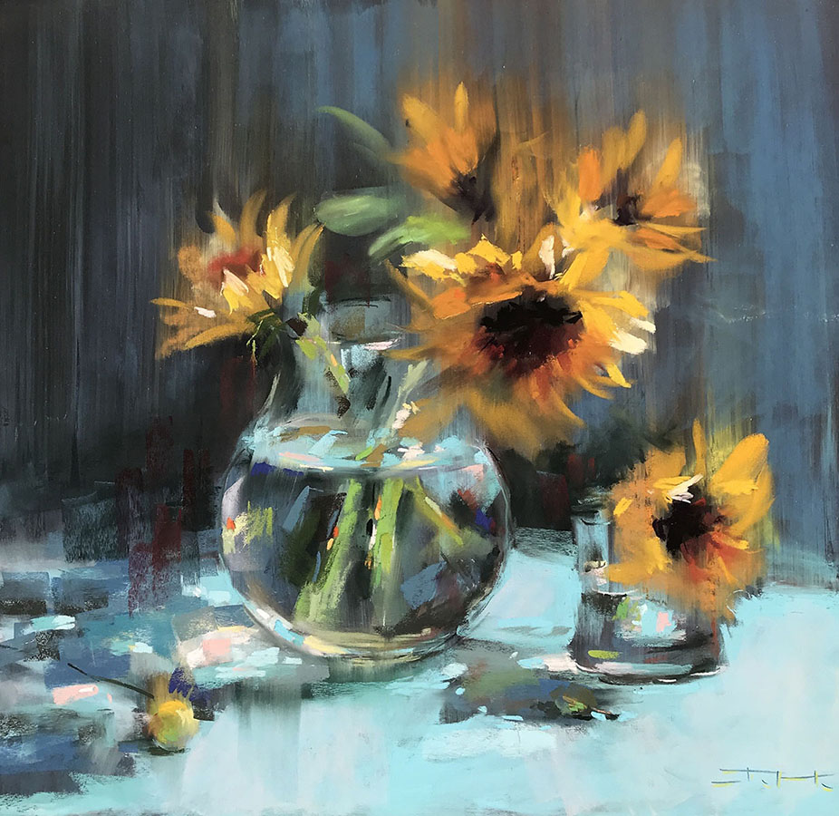 Sunflowers on a turquoise tablecloth